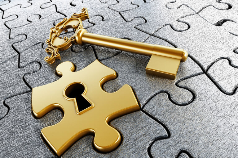 Un puzzle cu o cheie care simbolizeaza un selector cu cheie pentru automatizari porti.